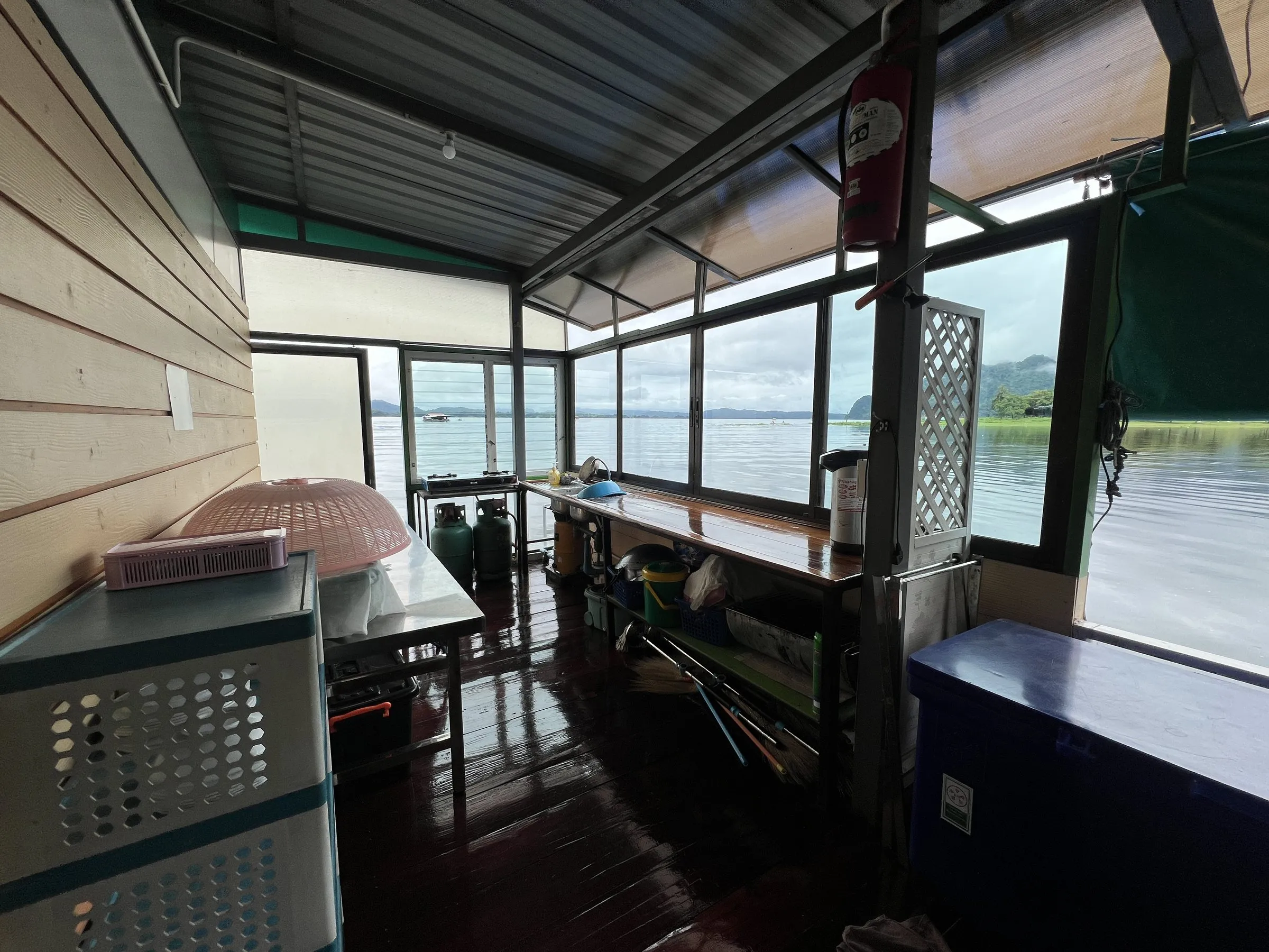 The galley end of the raft with the prep counter and windows onto the water.
